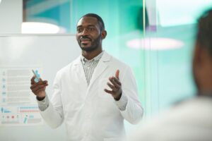 African American Man Presenting at Medical Seminar